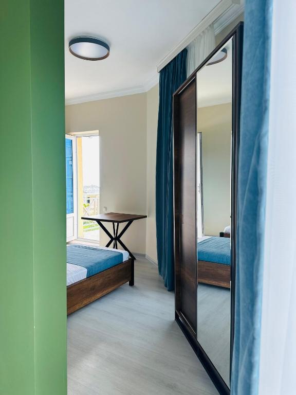 Postel nebo postele na pokoji v ubytování Hotel albatros shekvetili