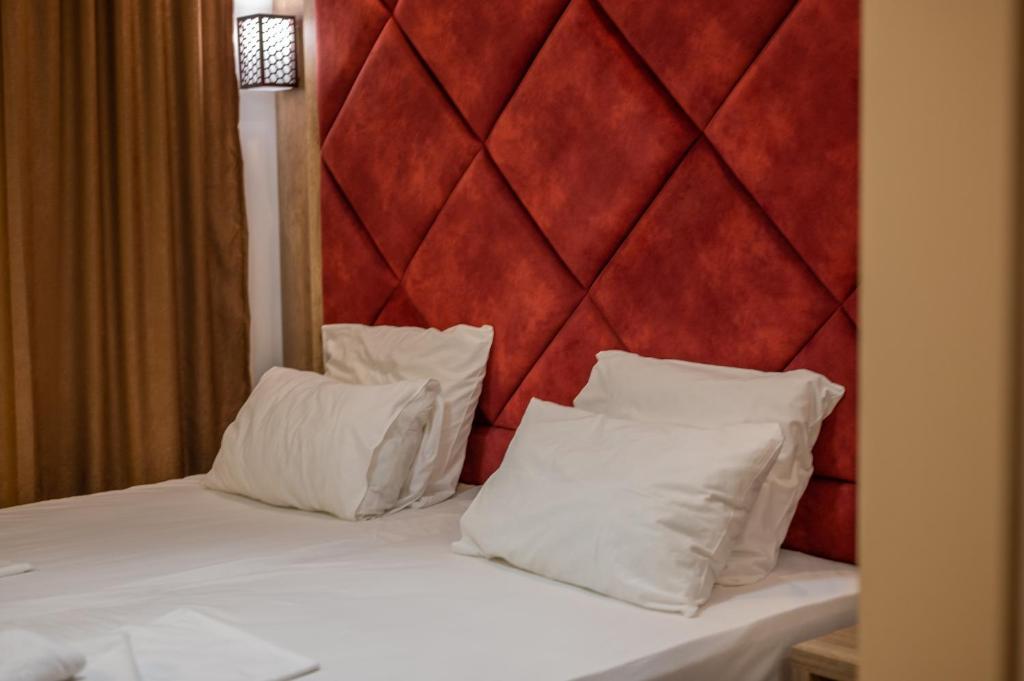 Postel nebo postele na pokoji v ubytování Hotel Evropa