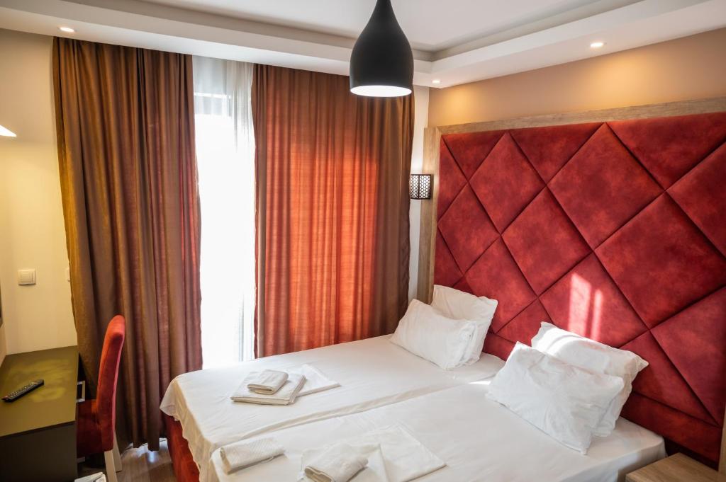 Postel nebo postele na pokoji v ubytování Hotel Evropa