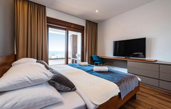 Łóżko lub łóżka w pokoju w obiekcie Villa Estate