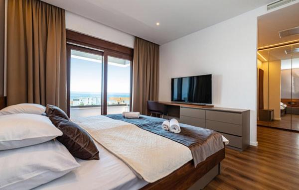 Łóżko lub łóżka w pokoju w obiekcie Villa Estate