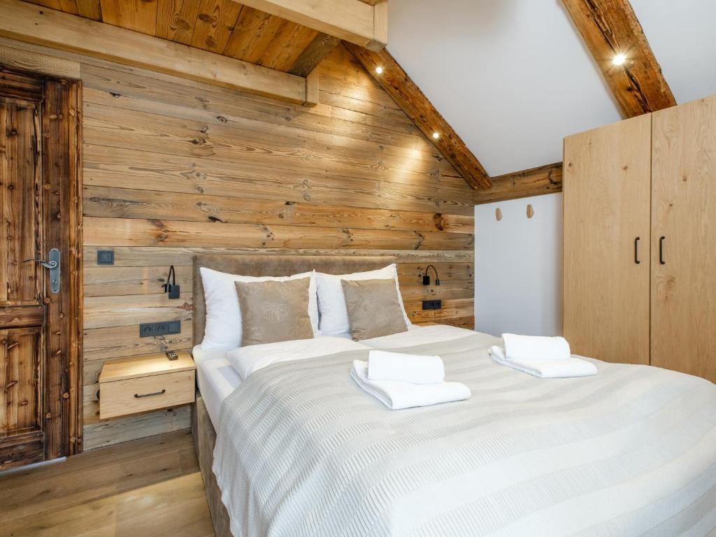 Postel nebo postele na pokoji v ubytování Chalet Petra