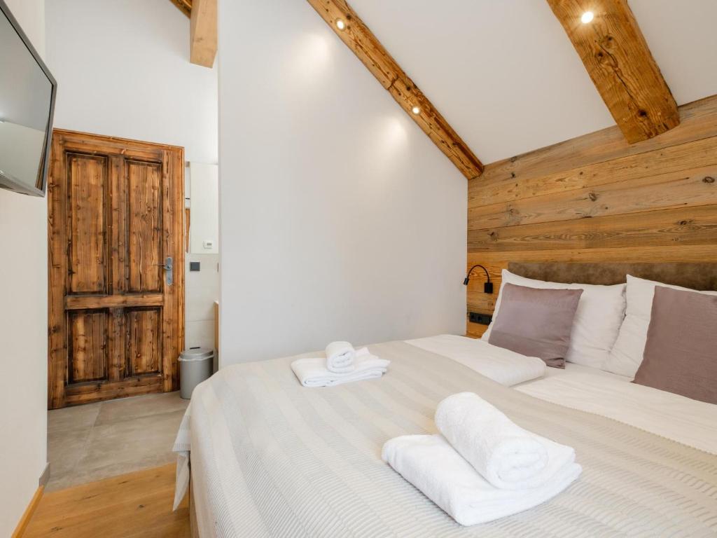 Postel nebo postele na pokoji v ubytování Chalet Petra