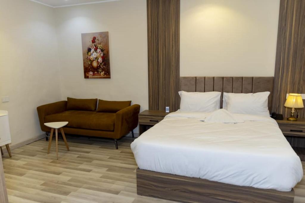 Postel nebo postele na pokoji v ubytování Maktub Pyramids Hotel