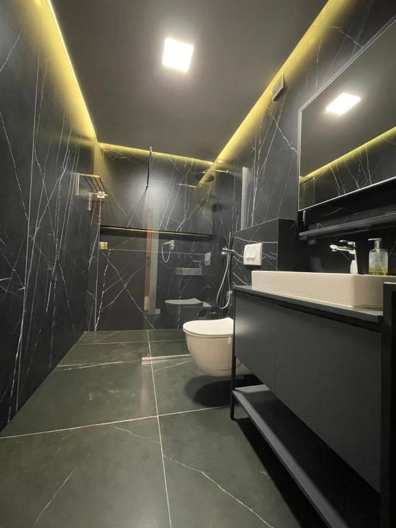 Koupelna v ubytování Apartament Koha