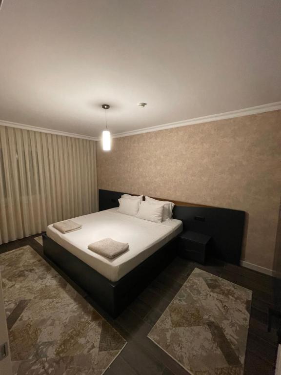 Postel nebo postele na pokoji v ubytování Apartament Koha