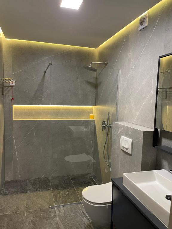 Koupelna v ubytování Apartament Koha