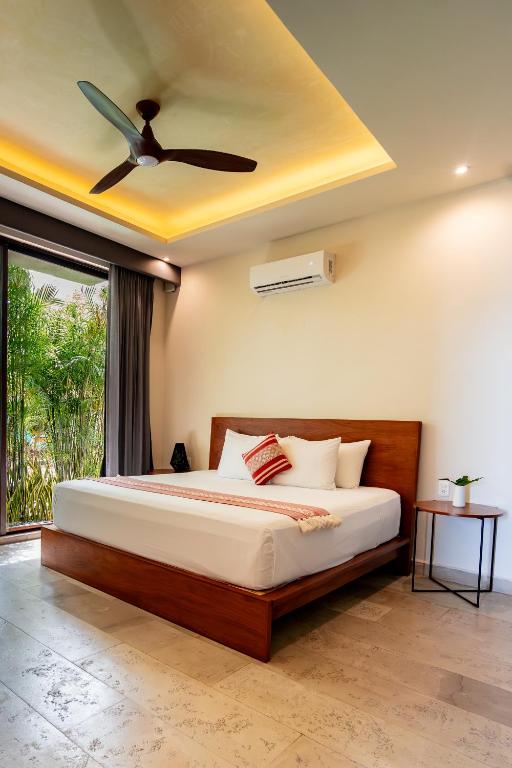 Postel nebo postele na pokoji v ubytování Khaban Bacalar Hotel Boutique