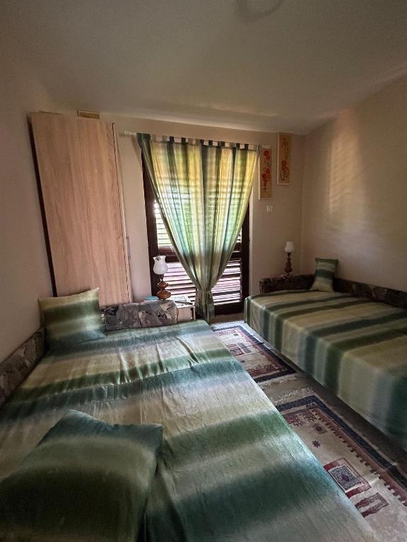 Postel nebo postele na pokoji v ubytování Tri Cveta