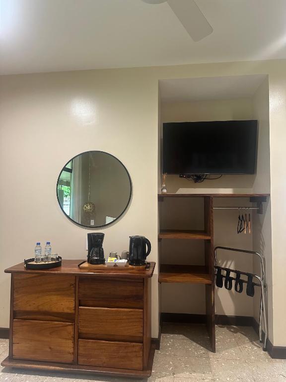 TV a/nebo společenská místnost v ubytování Hotel Diriá Santa Cruz
