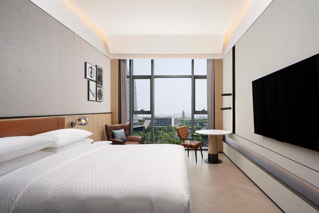 TV a/nebo společenská místnost v ubytování Four Points by Sheraton Suzhou Gusu