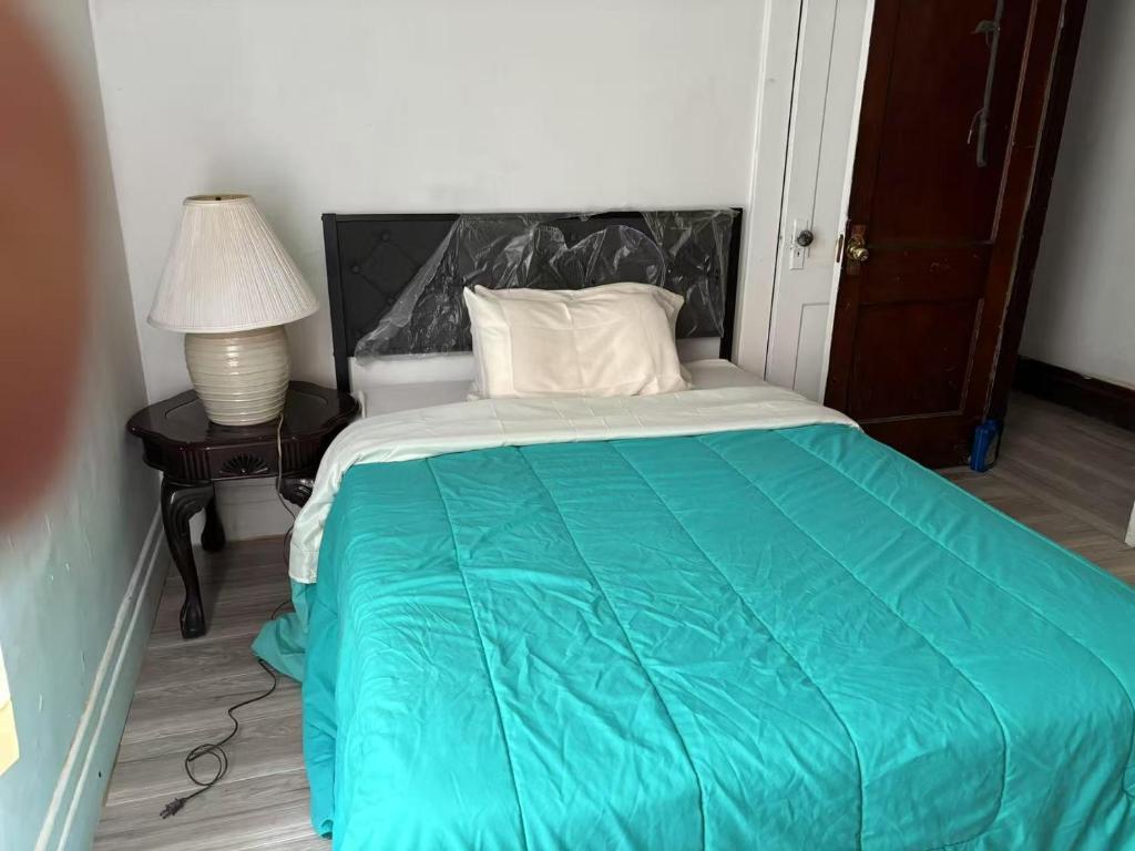 Postel nebo postele na pokoji v ubytování Home 18th Street