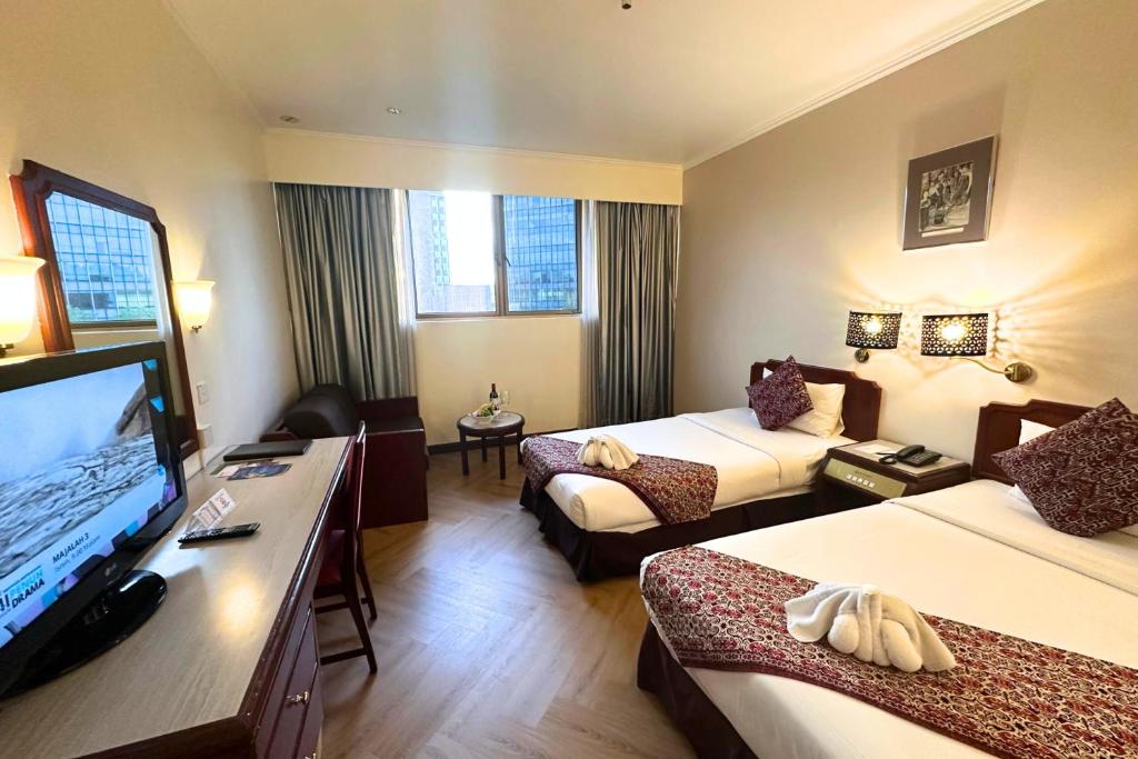 TV a/nebo společenská místnost v ubytování Hotel Shangri-la Kota Kinabalu