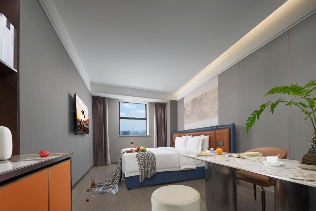 Posezení v ubytování Yuanshe Yiju Hotel