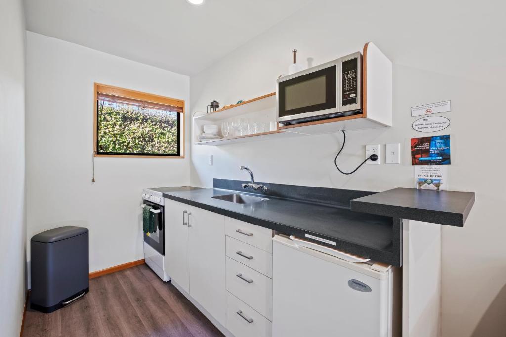 Alpine Garden Motel - Resim 32