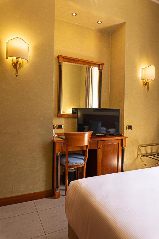 TV a/nebo společenská místnost v ubytování Hotel Miami