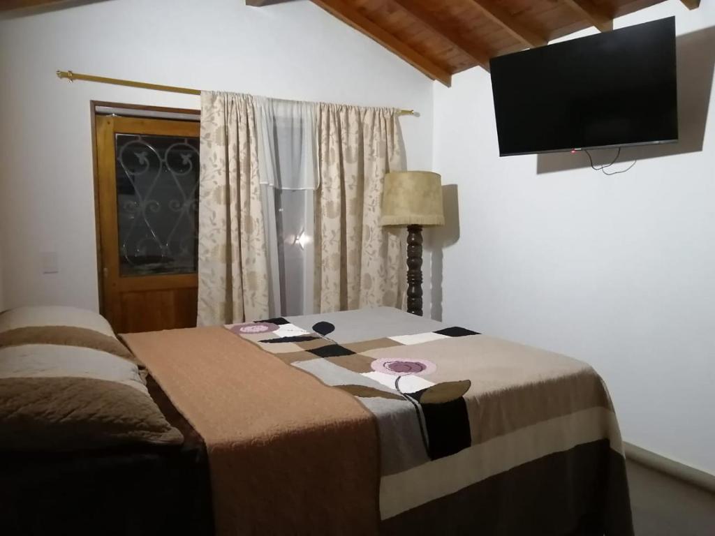 TV a/nebo společenská místnost v ubytování Hotel Olímpica