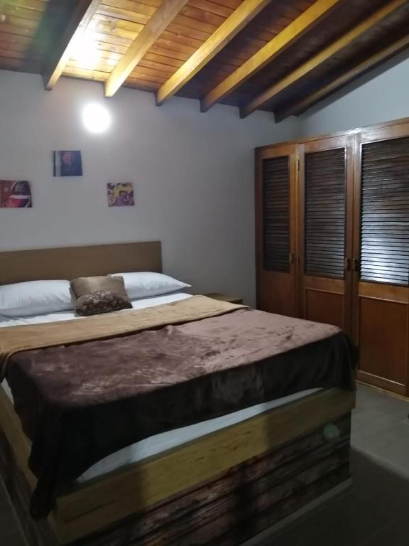 Postel nebo postele na pokoji v ubytování Hotel Olímpica