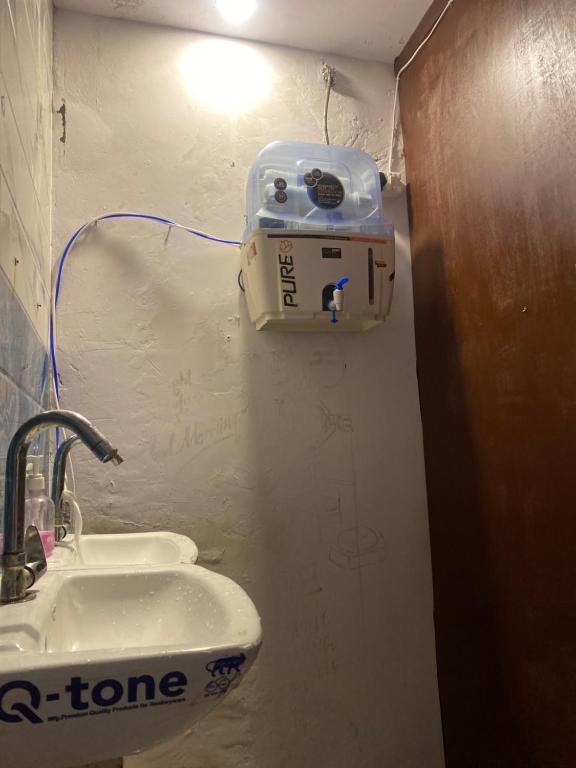 Ένα μπάνιο στο Cozy Inn Hostel