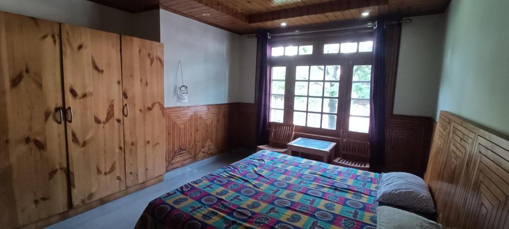 Postel nebo postele na pokoji v ubytování Leela Home - Full Mountain View