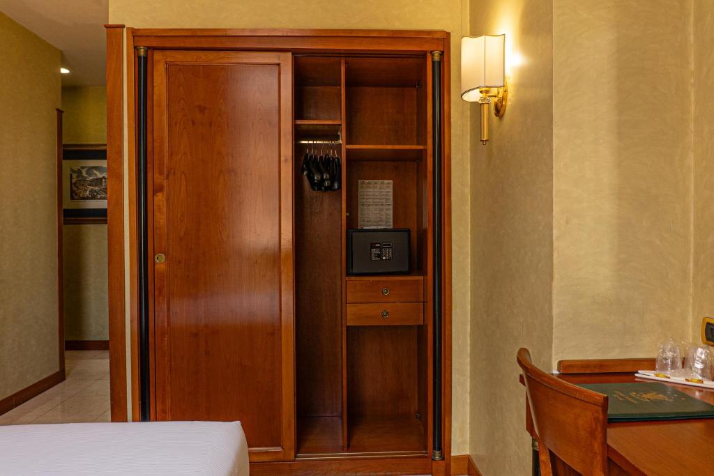 Postel nebo postele na pokoji v ubytování Hotel Miami