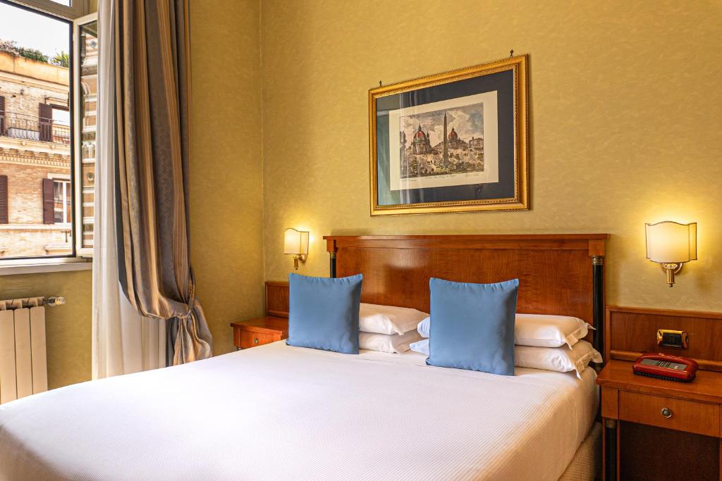 Postel nebo postele na pokoji v ubytování Hotel Miami