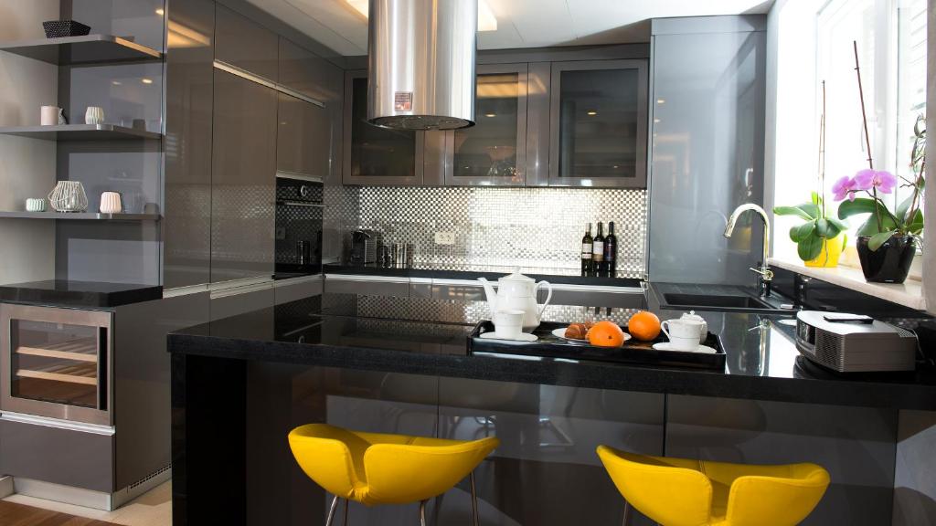 Kuchyň nebo kuchyňský kout v ubytování Flowers Dubrovnik Luxury Apartments