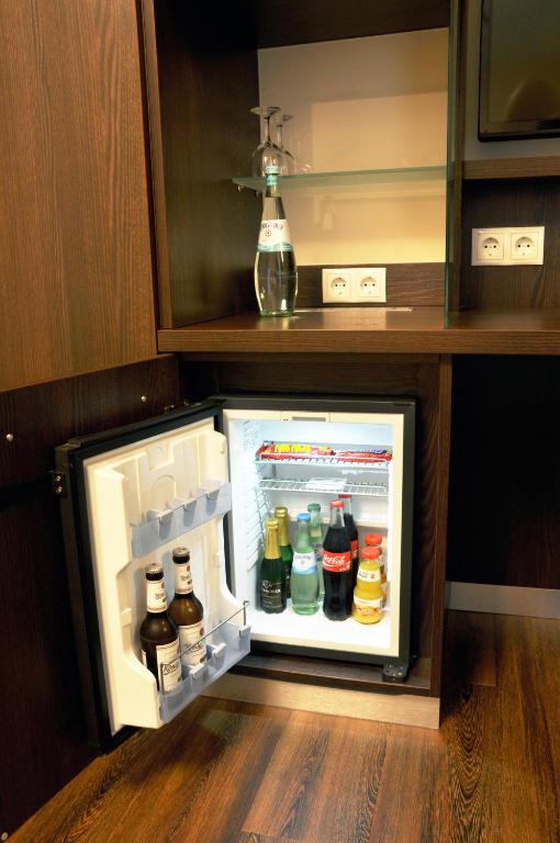 Kuchyň nebo kuchyňský kout v ubytování Hotel Drei Linden