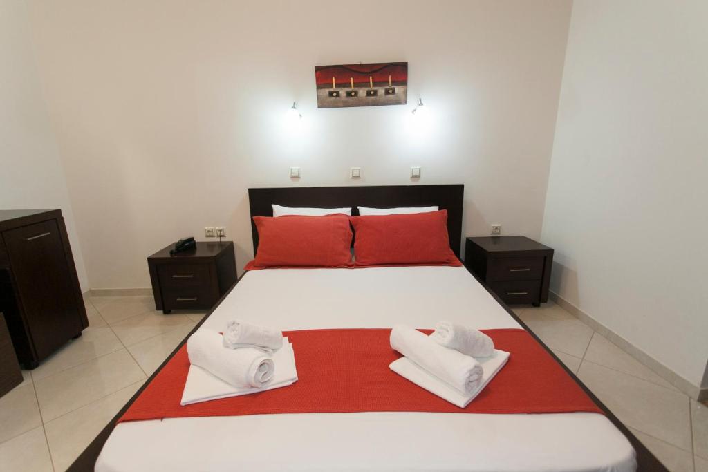 Postel nebo postele na pokoji v ubytování Siarbas Hotel