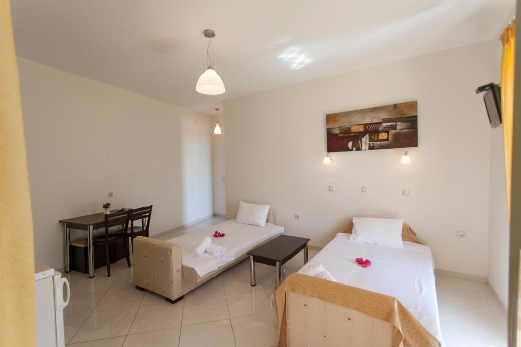 Postel nebo postele na pokoji v ubytování Siarbas Hotel