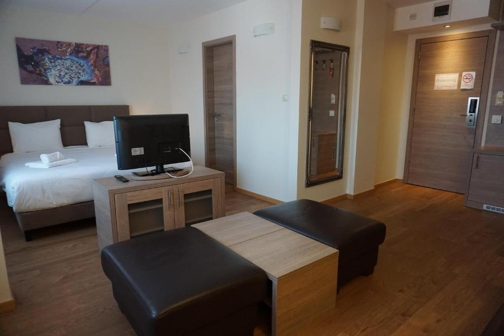 TV a/nebo společenská místnost v ubytování Vitta Hotel Superior