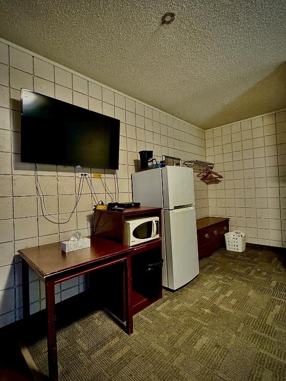 Kuchyň nebo kuchyňský kout v ubytování Caravel Motel