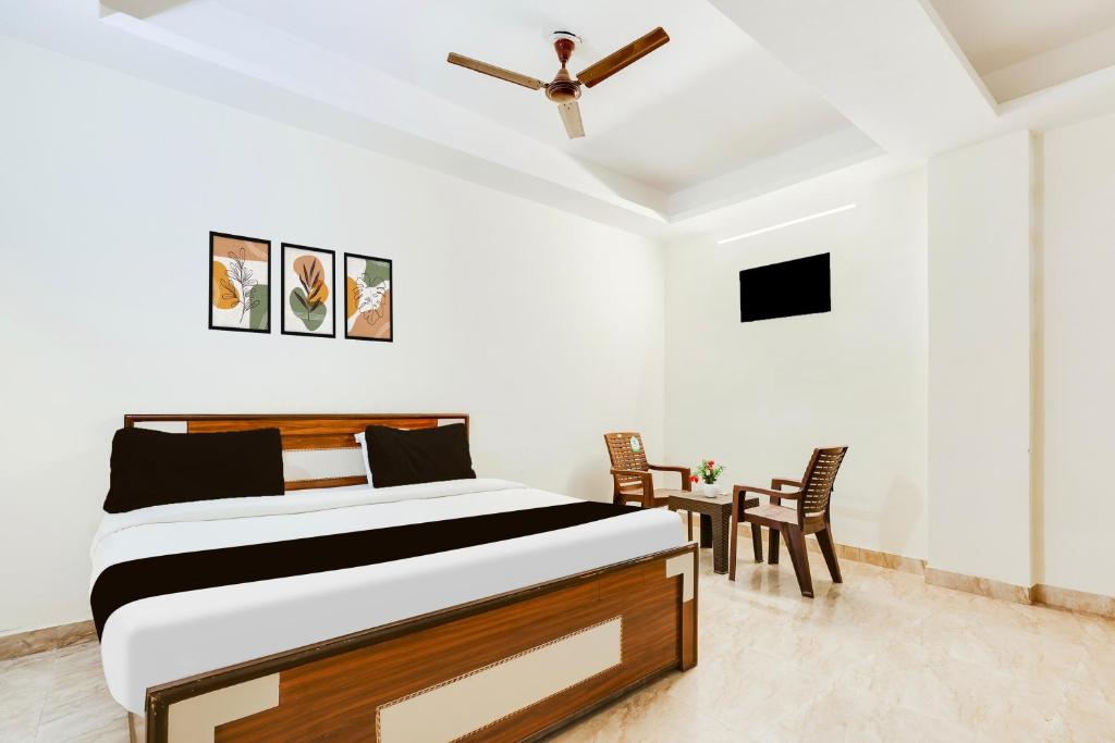 Postel nebo postele na pokoji v ubytování HOTEL O RAJ STAY