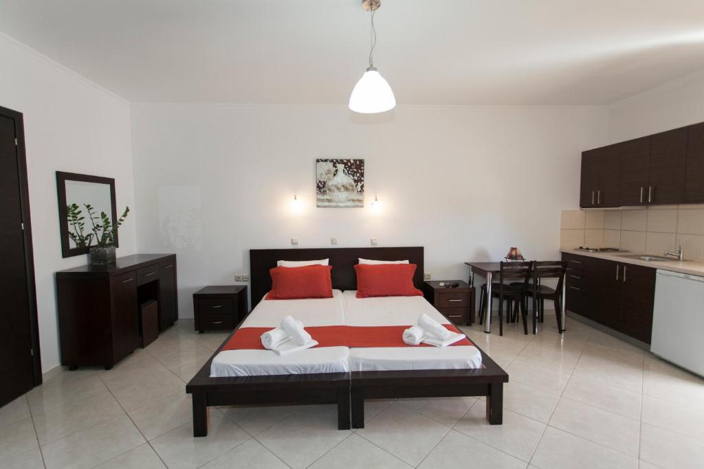 Postel nebo postele na pokoji v ubytování Siarbas Hotel