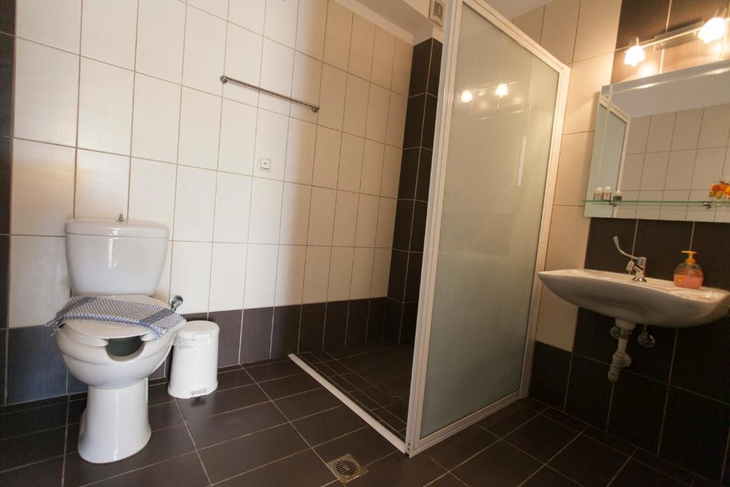 Koupelna v ubytování Siarbas Hotel