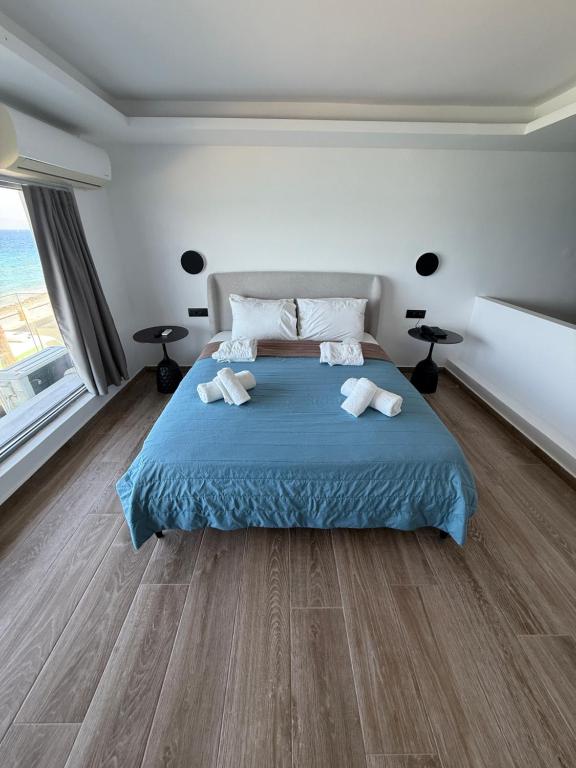 Postel nebo postele na pokoji v ubytování Sunrise Luxury Apartments Rhodes