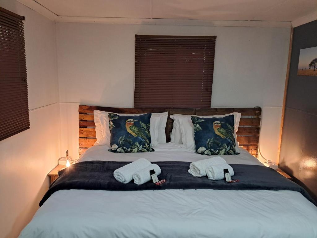 Ένα ή περισσότερα κρεβάτια σε δωμάτιο στο Sable Sunset Guesthouse