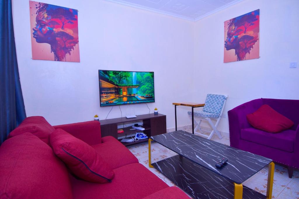 TV a/nebo společenská místnost v ubytování Linet's apartment