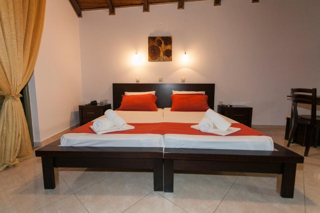 Postel nebo postele na pokoji v ubytování Siarbas Hotel