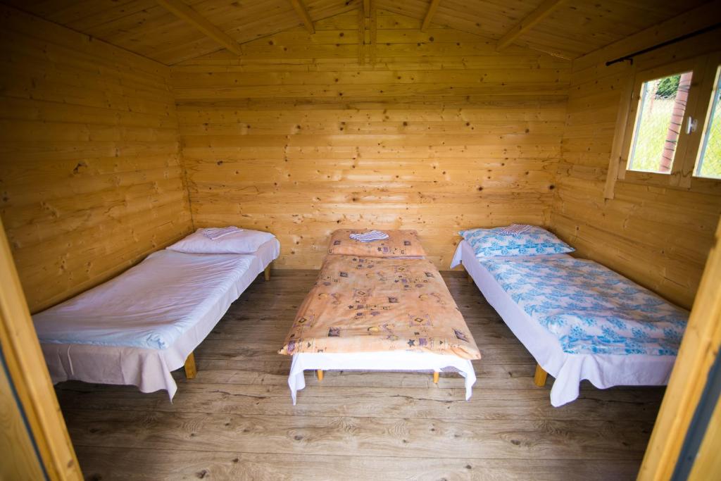 Rúm í herbergi á Chatičky Centrum Pastvinská přehrada