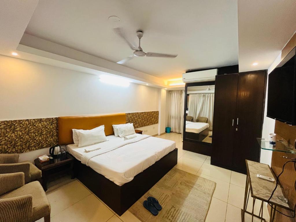 Postel nebo postele na pokoji v ubytování Hotel C 5 Hauz Khas