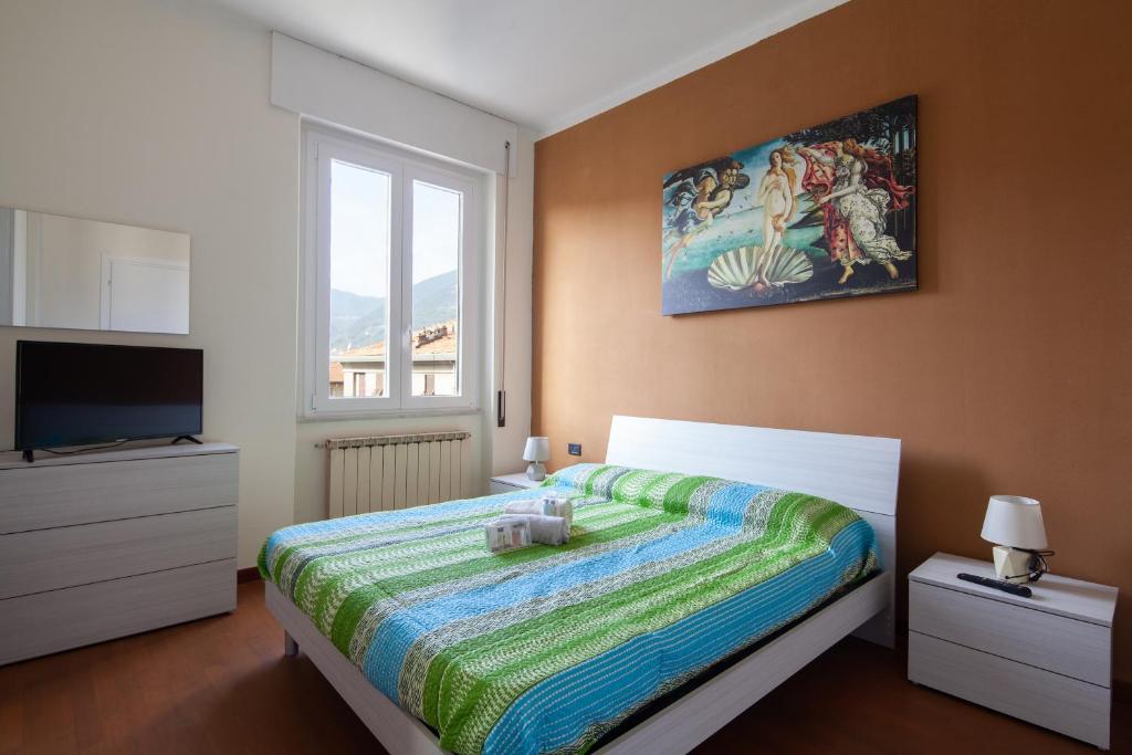 Postel nebo postele na pokoji v ubytování Il Cinquecento Suites