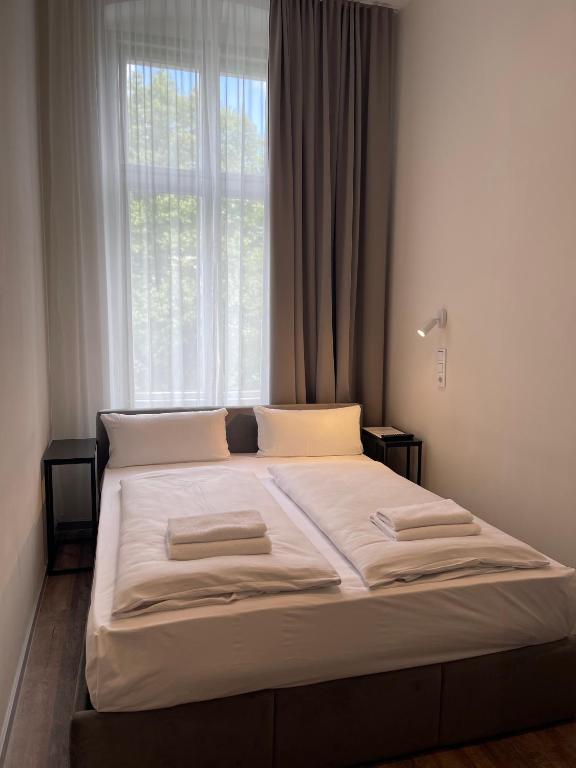 Postel nebo postele na pokoji v ubytování Motel Blue