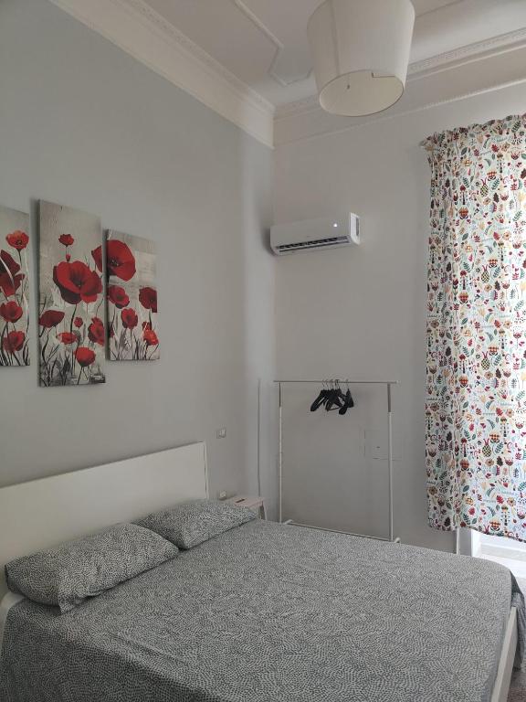 Łóżko lub łóżka w pokoju w obiekcie Maison Salerno