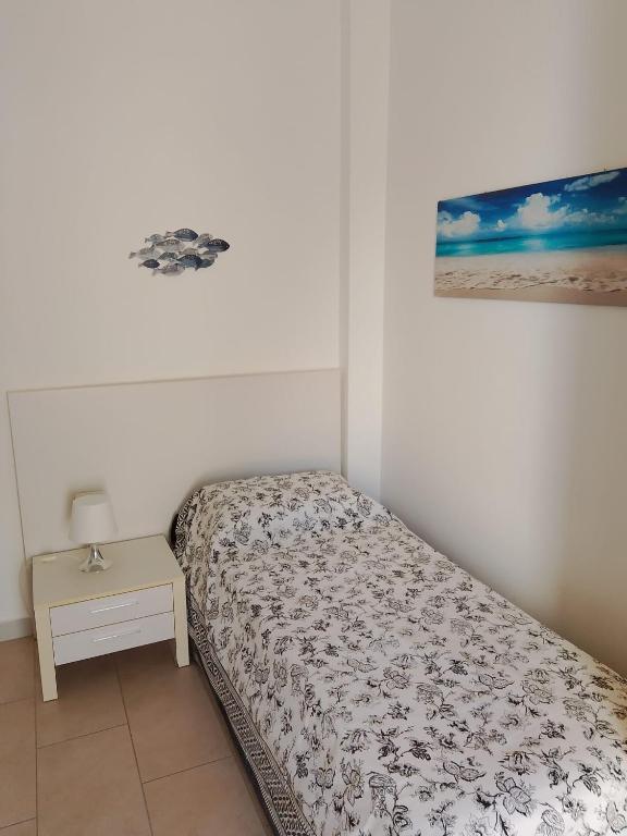 Cama ou camas em um quarto em Alla Scala colorata