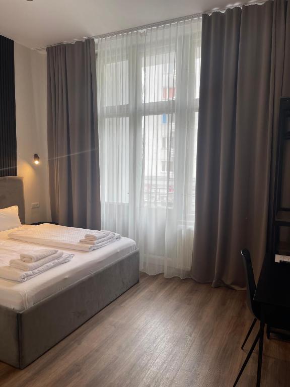 Postel nebo postele na pokoji v ubytování Motel Blue