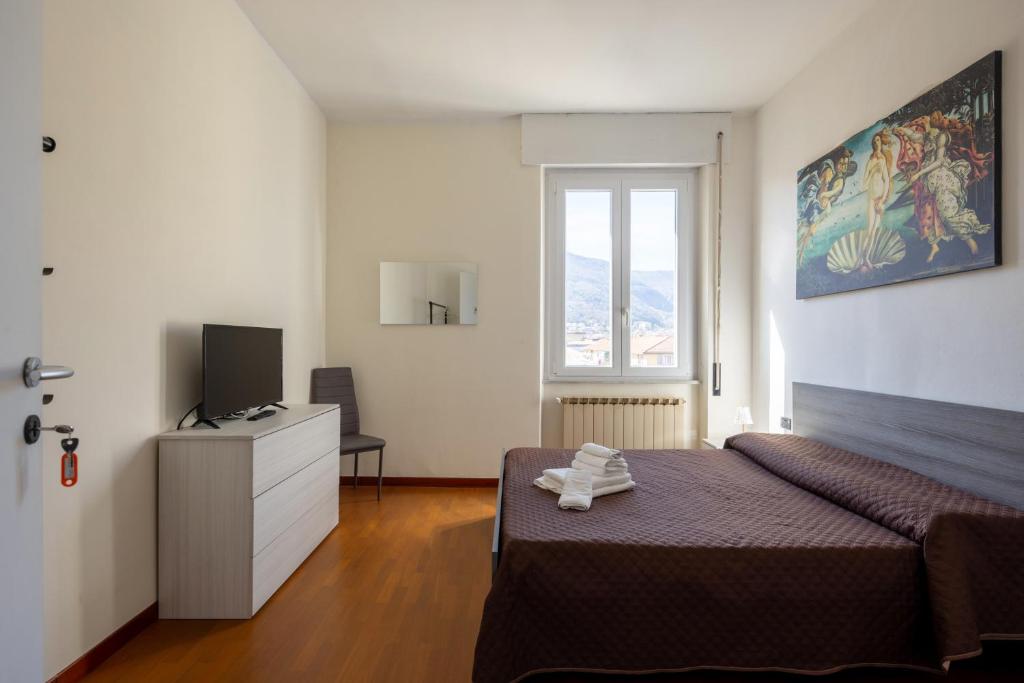 TV a/nebo společenská místnost v ubytování Il Cinquecento Suites