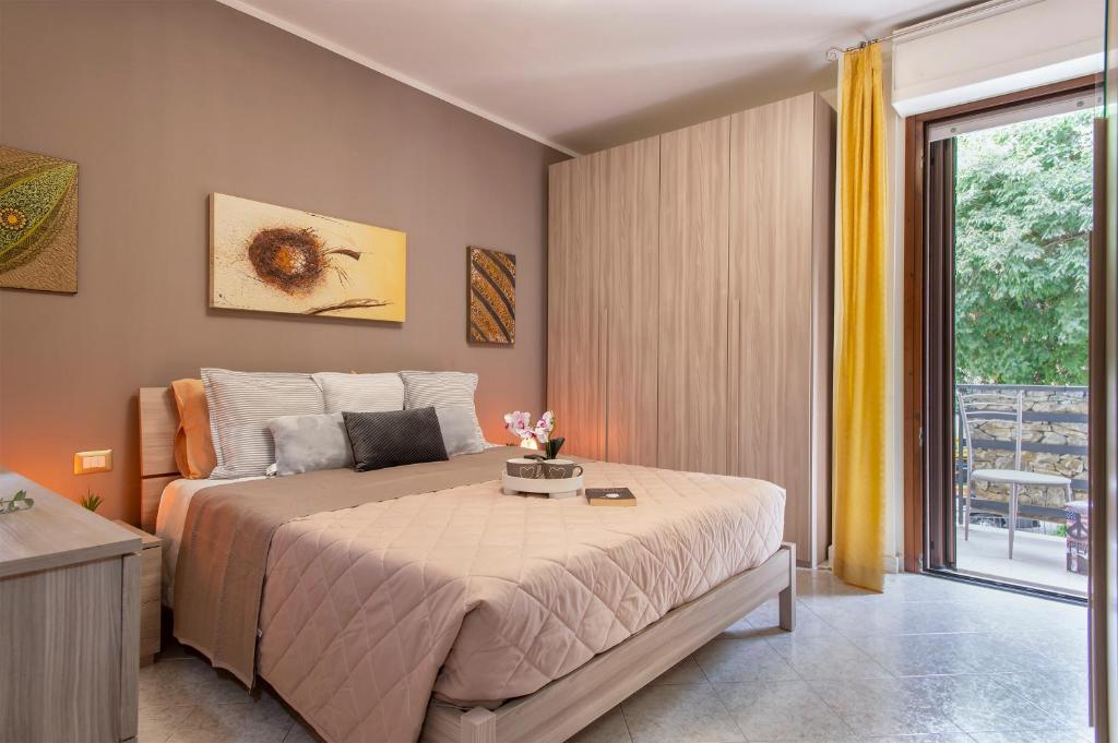 Ένα ή περισσότερα κρεβάτια σε δωμάτιο στο SARDINIA RE - Shabby Apartment