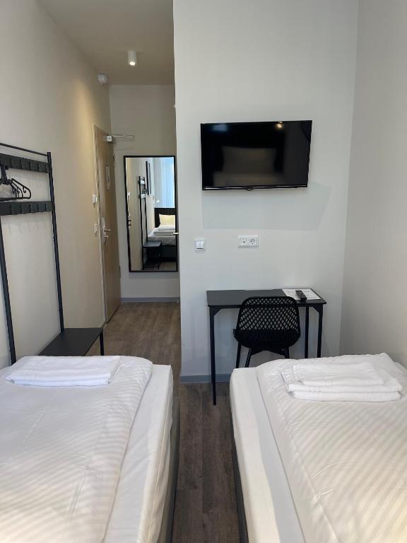 Postel nebo postele na pokoji v ubytování Motel Blue
