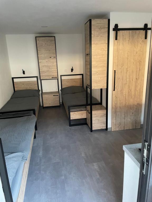 Postel nebo postele na pokoji v ubytování Ubytovacie zariadenie U Mudajov